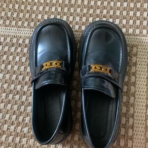 Black Loafers with Gold Accent